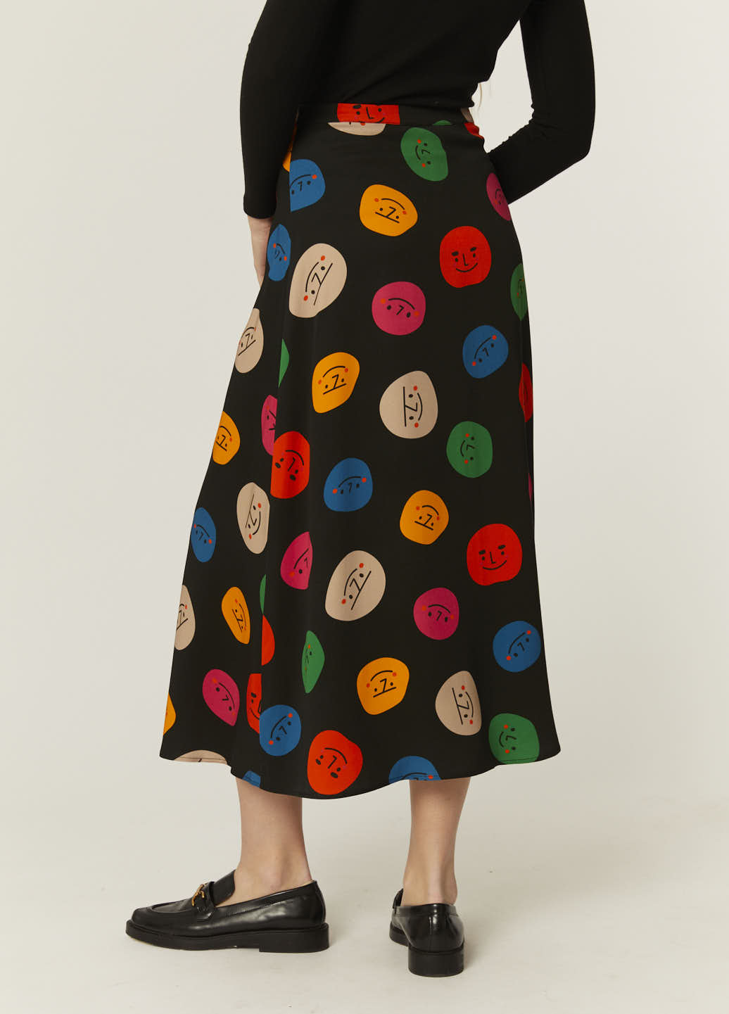 FALDA ESTAMPADA CARAS